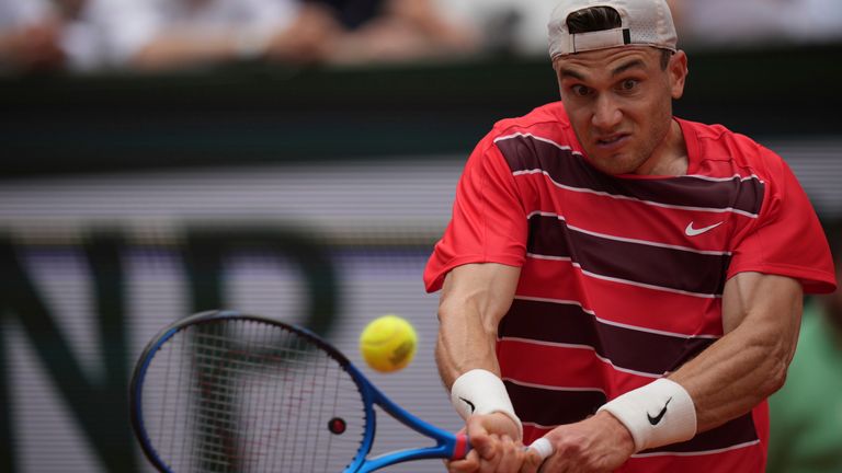 Jack Draper returns the ball to Brazil's Joao Fonseca during their third-round match at the French Open