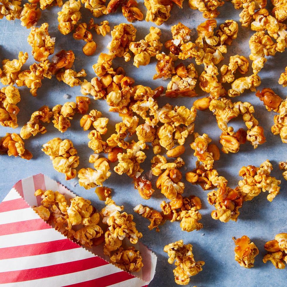 Salted Honey Peanut Caramel Corn caramel sauce, honey, and roasted peanuts get tossed with popcorn and baked until crisp and crunchy