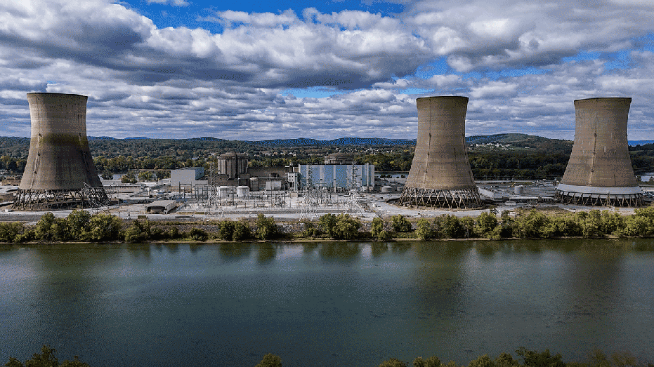 The shuttered Three Mile Island nuclear power plant, located in the middle of the Susquehanna River, in Middletown, Pennsylvania, US, on Wednesday, Oct. 16, 2024. Constellation Energy Corp., the owner of the shuttered Three Mile Island nuclear plant, will invest $1.6 billion to revive it, agreeing to sell all the output to Microsoft Corp. as the tech titan seeks carbon-free electricity for data centers to power the artificial intelligence boom. Photographer: Heather Khalifa/Bloomberg via Getty Images
