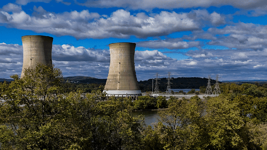 The shuttered Three Mile Island nuclear power plant, located in the middle of the Susquehanna River, in Middletown, Pennsylvania, US, on Wednesday, Oct. 16, 2024. Constellation Energy Corp., the owner of the shuttered Three Mile Island nuclear plant, will invest $1.6 billion to revive it, agreeing to sell all the output to Microsoft Corp. as the tech titan seeks carbon-free electricity for data centers to power the artificial intelligence boom. Photographer: Heather Khalifa/Bloomberg via Getty Images